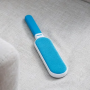 Clothing electrostatic brush