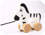 Drewniana zebra do ciągnięcia na sznurku Tooky Toy