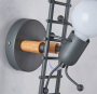 Iron modern Art Villain creative head climbing wall lamp