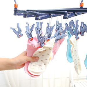 Plastic folding clothes hanger-19 clips -dark purple