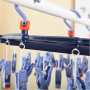 Plastic folding clothes hanger-19 clips -dark purple