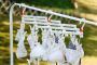 Plastic folding clothes hanger-19 clips -white