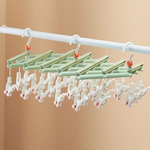Plastic folding clothes hanger-29 clips -green