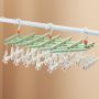 Plastic folding clothes hanger-29 clips -green