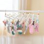 Plastic folding clothes hanger-29 clips -white