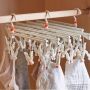 Plastic folding clothes hanger-29 clips -white